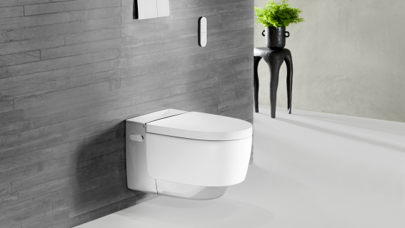 Hromēts Geberit AquaClean Mera Comfort modelis ar Sigma70 tālvadības pulti